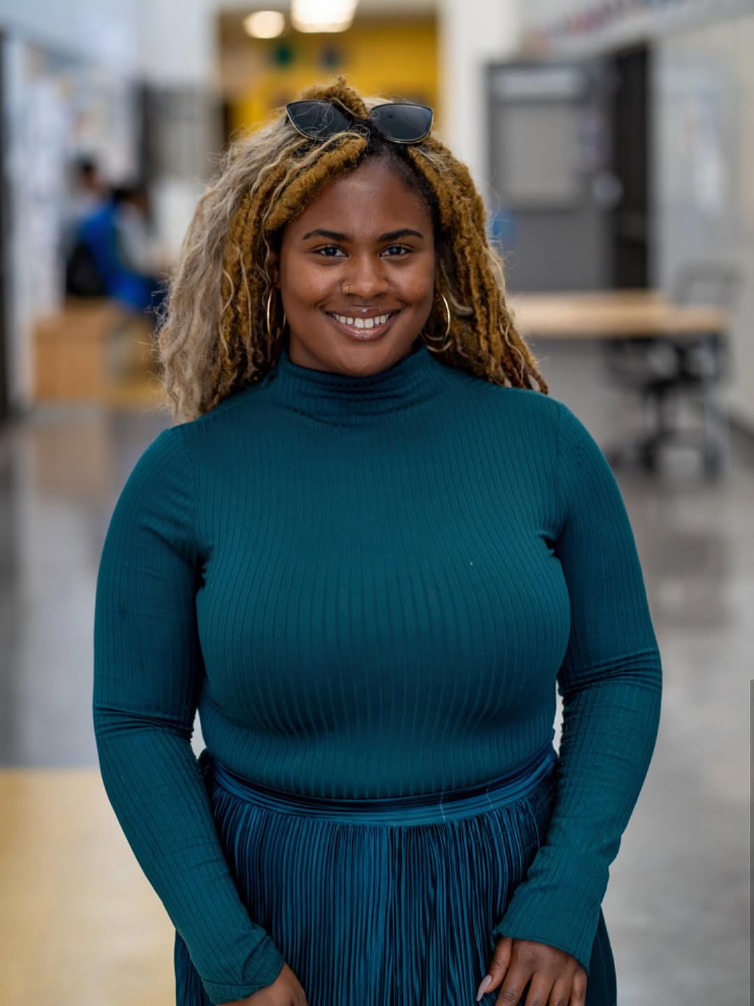 This image shows Latetia Bobo, a beloved 8th-grade English Language Arts teacher at Caliber Beta Academy.