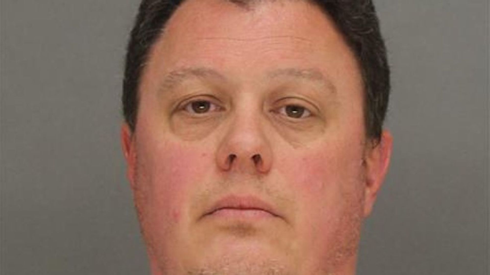 A mugshot of Bradley D. Hounsell.